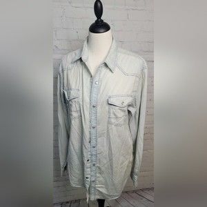 Coastal Shacket size Lg in a light denim.